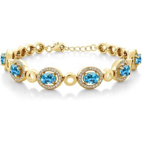Gem Stone King 18K Yellow Gold Plated Silver Swiss Blue Topaz Tennis Bracelet For Women (7.92 Cttw, Gemstone Birthstone, Oval 7X5MM, 7 Inch with 1 Inch Extender)