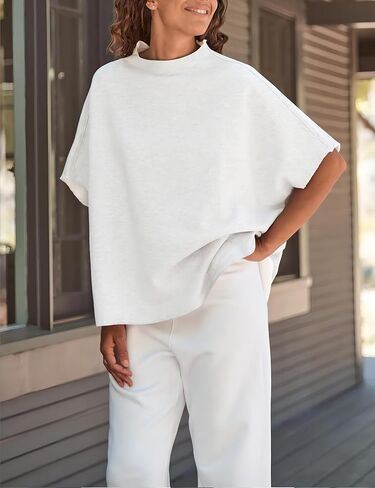 بلوزات نسائية ذات رقبة دائرية كبيرة الحجم وأكمام تشبه جناح الخفاش وسترات صوفية كاجوال in Kuwait