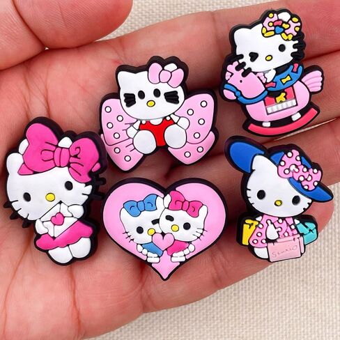25,40 قطعة من سحر أحذية كيتي اللطيفة للفتيات التمساح، إكسسوارات ساحرة من الفخار Kawaii الوردي لتزيين سوار معصم أطفال التمساح، هدايا للحفلات. in Kuwait