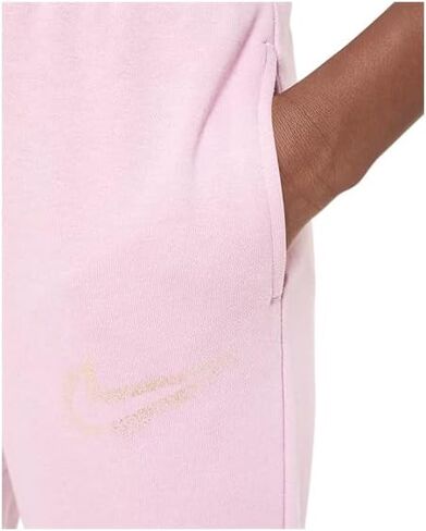 بنطال Nike NSW Fleece WC للفتيات (الأطفال الصغار/الأطفال الكبار) وردي أساسي/ذهبي معدني LG (14 طفل كبير) in Kuwait