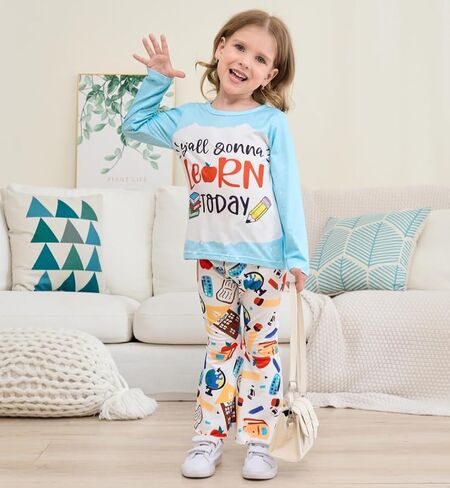 Toddler Girl Clothes Long Sleeve Cartoon & Letter Graphic Top + Fruit Stationery Print Flared Leg Pants in Saudi Arabia
