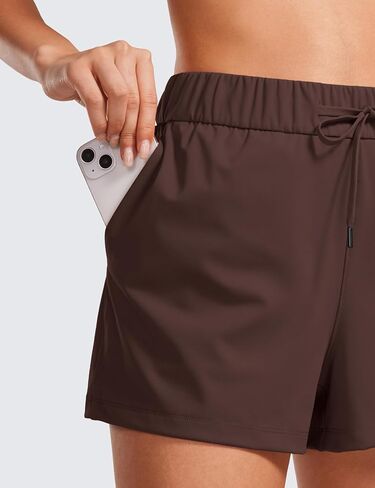 شورت CRZ YOGA مطاطي للنساء للعمل كاجوال 2.5 بوصة - شورت رياضي مع جيوب للتمرين والسفر والمشي لمسافات طويلة والجولف in Saudi Arabia