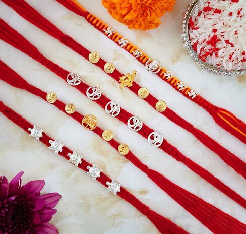 راخي للأخ - مجموعة من 5 قطع مع تصميم روحي بلمسة نهائية فضية وذهبية مؤكسدة لمصمم راكشا باندهان، خيط راخي لبهايا in Kuwait