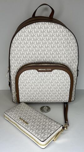 حقيبة ظهر Michael Kors MICHAEL Michael Kors Jaycee بجيب كبير بسحاب مزودة بمحفظة كونتيننتال كبيرة/خطاف محفظة معصم (Signature MK Vanilla) in Saudi Arabia