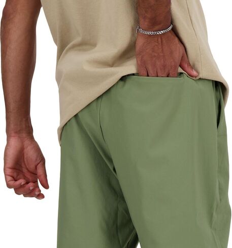 New Balance Men's Ac Tapered Pant 29" in Saudi Arabia
