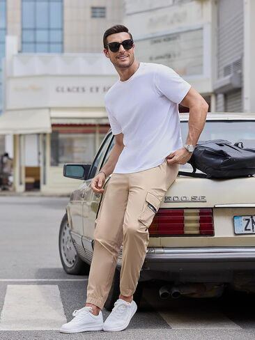 بنطال Cargo Jogger للرجال بخصر مطاطي ورباط وقصة ضيقة مع جيوب بسحاب من القطن للرجال in Kuwait