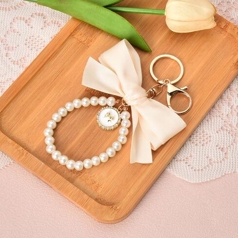 Pearl Bow Keychain Wistlet for Girls Women Bow Pearl Keychains Pink Black Beige in Saudi Arabia