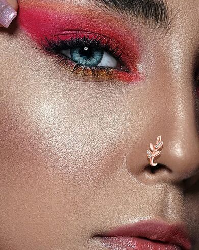 Fxiqini 12 قطعة من أساور الأنف الصناعية الأفريقية غير المثقوبة المرصعة بالزركونيا المكعبة على حلقة الأنف على شكل نجمة زهرة ورقة قلب CZ على شكل حلقة أنف وهمية للنساء والرجال باللون الفضي والذهبي الوردي in Kuwait