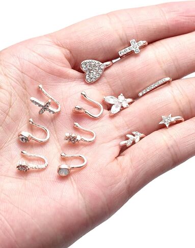 Fxiqini 12 قطعة من أساور الأنف الصناعية الأفريقية غير المثقوبة المرصعة بالزركونيا المكعبة على حلقة الأنف على شكل نجمة زهرة ورقة قلب CZ على شكل حلقة أنف وهمية للنساء والرجال باللون الفضي والذهبي الوردي in Kuwait