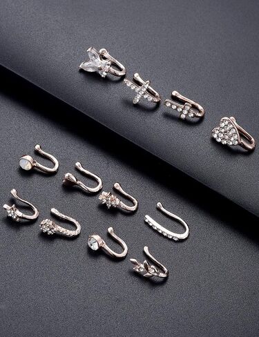 Fxiqini 12 قطعة من أساور الأنف الصناعية الأفريقية غير المثقوبة المرصعة بالزركونيا المكعبة على حلقة الأنف على شكل نجمة زهرة ورقة قلب CZ على شكل حلقة أنف وهمية للنساء والرجال باللون الفضي والذهبي الوردي in Kuwait
