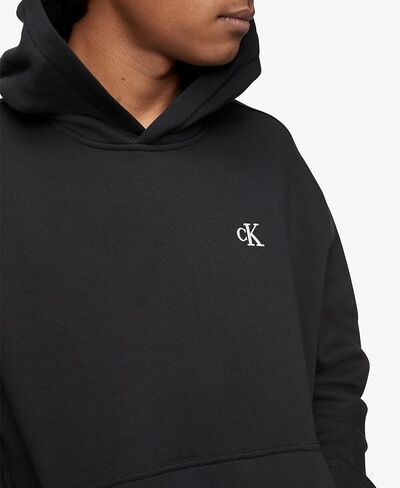 Calvin Klein Men's Relaxed Fit Monogram Logo Fleece Hoodie in Saudi Arabia