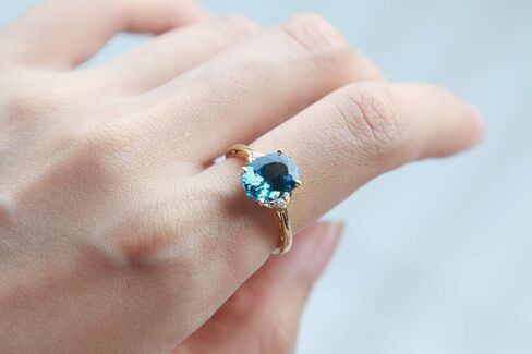 Gin & Grace 10K Yellow Gold Genuine London Blue Topaz Ring with Diamonds for women | Ethically, authentically & organically sourced (Oval-cut) shaped London Blue Topaz hand-crafted jewelry for her in Saudi Arabia