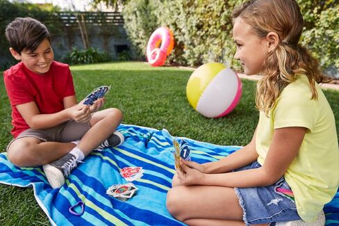 Mattel Games UNO Flip Splash Matching Card Game Featuring 112 Water Resistant 2-Sided Cards, Game Night, Gift Ages 7 Years & Older in Saudi Arabia