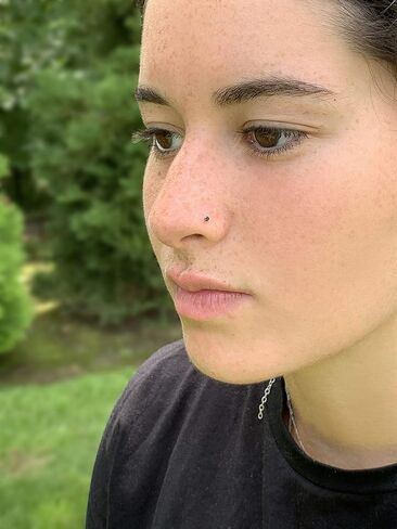 Lavari Jewelers 0.01 to 0.07 Carat Black Diamond Curved Screw Nose Ring for Women in 14k White or Yellow Gold 22 Gauge Nose Ring in Kuwait