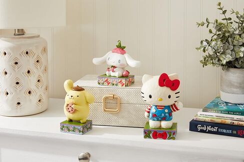 Enesco Sanrio by Jim Shore Pompompurin with Cookie Figurine- Stone Resin Hand Painted Crafted Collectible Hello Kitty Figurines Home Decor Statue, 5 Inch in Saudi Arabia