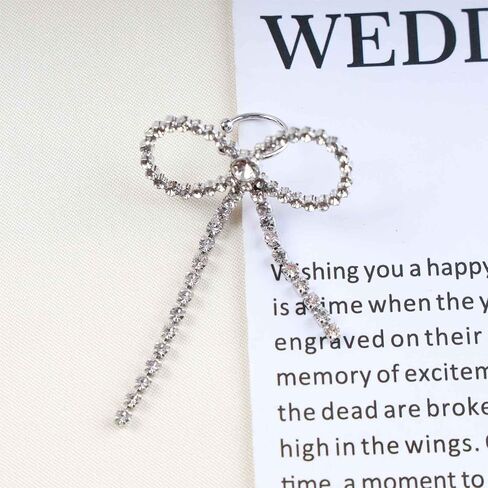 Boho Crystal Bow Ear Clip Earrings Vintage Silver CZ Cartilage Clip Earrings Rhinestone Bow Clip Cuff Earrings Minimalist Bow Wrap Hoop Earrings Jewelry for Women and Girls(left) in Saudi Arabia