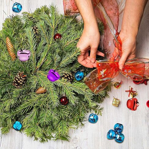 BronaGrand 100 Pieces Multi-Color Small Cross Bells Christmas Jingle Bells Metal Craft Bells for DIY Bracelet Necklace Knitting Jewelry Making Home Party Decor in Saudi Arabia
