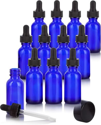 JUVITUS 2 oz Cobalt Blue Glass Boston Round Bottles with Two Closures: Black Glass Droppers and Phenolic Caps (12 Pack) in Saudi Arabia