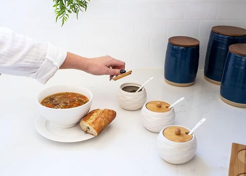 مجموعة حاوية وصينية توابل حجرية مستديرة سوداء من Nat & Jules سعة 9 أونصة in Kuwait