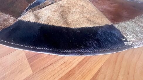 سجادة من جلد البقر، جلد بني فاتح، مساحة دائرية مرقعة على شكل نجمة 40 بوصة، لتزيين غرف النوم وغرف الطعام وغرف المعيشة in Kuwait