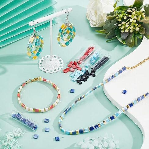 مجموعة خرز تيلا 790 قطعة 3 مقاسات من NBEADS، فاصل خرز زجاجي بفتحتين 10 ألوان مع 300 قطعة خرز بذور مستديرة 5 × 5 مم/5 × 2 مم/5 × 1 مم خرز زجاجي ياباني صغير لسوار وقلادة وأقراط صناعة المجوهرات in Saudi Arabia