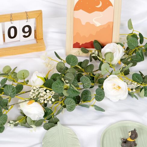 Cyblinia Eucalyptus Garland 6 FT Artificial Flower Garland Floral Vines 1 Pcs Eucalyptus Leaves Vines with Camellias Flowers for Wedding Party Decor in Saudi Arabia