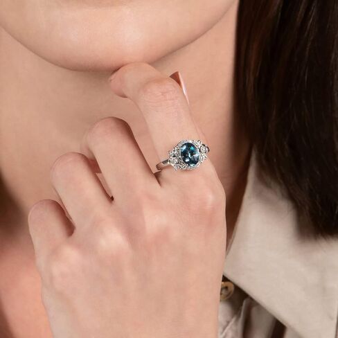 Jewelili Enchanted Disney Fine Jewelry Sterling Silver with 1/10 Cttw Diamond and London Blue Topaz Cinderella 70th Ring in Saudi Arabia