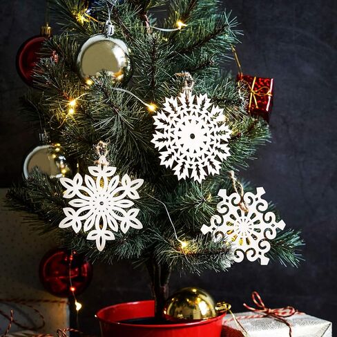 ندفات ثلج خشبية غير مكتملة، 27 قطعة من الحلي المعلقة على شكل ندفات الثلج بحبل، زينة عيد الميلاد DIY، 9 تصميمات in Kuwait