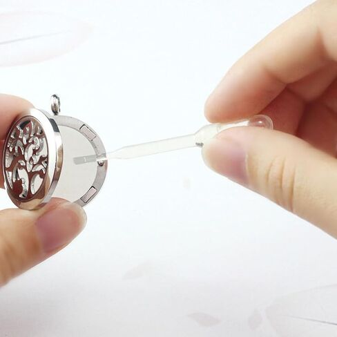 BESTOYARD 100Pcs Aroma Diffuser Refill Pads Round Essential Oil Pads Cotton Aromatherapy Replacement Pads for Diffuser Necklace Car Diffuser Vent Clip Bracelet White in Kuwait