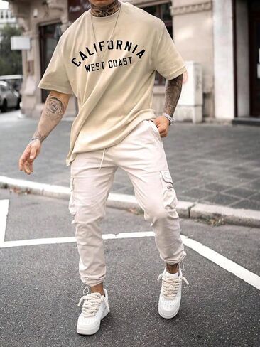 GORGLITTER Men's Letter Graphic Drop Shoulder T-Shirt Short Sleeve Mock Neck Tees in Kuwait