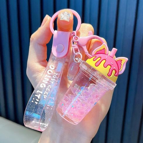 زينة على شكل حلقة مفاتيح على شكل كعكة الدونات، ملحقات حقيبة يد الثعلب العائمة ذات الرمال المتحركة السائلة in Kuwait