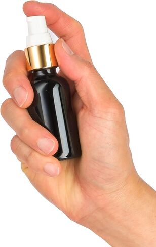 JUVITUS 1 oz / 30 ml Black Glass Luxury Boston Round Bottle with Gold Treatment Pump (12 pack) in Kuwait