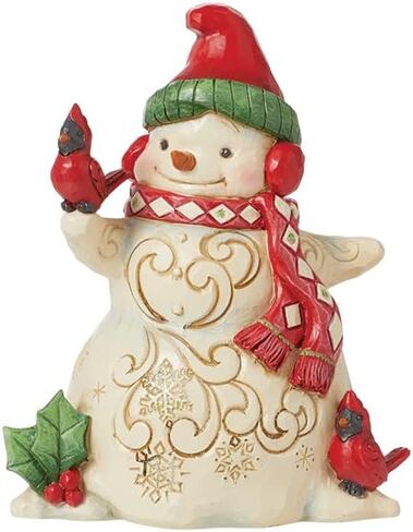 Enesco Jim Shore Heartwood Creek رجل ثلج مع غطاء للأذنين وتمثال كاردينالز - تمثال رجل ثلج مصنوع يدويًا من الراتنج الحجري، تمثال ديكور منزلي لعيد الميلاد، 5.51 بوصة in Saudi Arabia