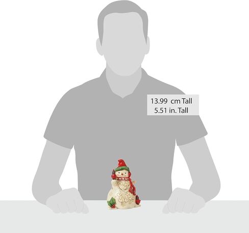 Enesco Jim Shore Heartwood Creek رجل ثلج مع غطاء للأذنين وتمثال كاردينالز - تمثال رجل ثلج مصنوع يدويًا من الراتنج الحجري، تمثال ديكور منزلي لعيد الميلاد، 5.51 بوصة in Saudi Arabia