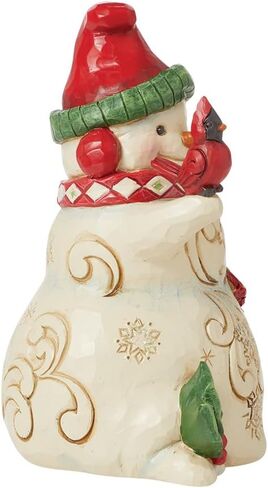 Enesco Jim Shore Heartwood Creek رجل ثلج مع غطاء للأذنين وتمثال كاردينالز - تمثال رجل ثلج مصنوع يدويًا من الراتنج الحجري، تمثال ديكور منزلي لعيد الميلاد، 5.51 بوصة in Saudi Arabia
