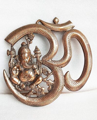 PARIJAT HANDICRAFT Metal om Ganesha Idol Metal Wall Hanging Statue for Wall Decor Door Decor or Gift for Someone. in Saudi Arabia