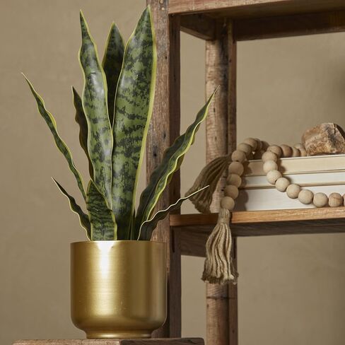 Deco 79 The Novogratz Faux Foliage Snake Artificial Plant with Realistic Leaves and Gold Porcelain Pot, 13" x 11" x 20", Green in Saudi Arabia