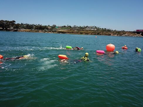 Zoot Ultra Swim Safety Buoy & Dry Bag, High-Visibility Open-Water Safety Floatation Device with Storage for Long-Distance Swimming Training Sessions (15L) - Neon Orange - 15L in Saudi Arabia