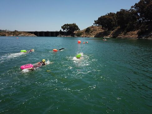 Zoot Ultra Swim Safety Buoy & Dry Bag, High-Visibility Open-Water Safety Floatation Device with Storage for Long-Distance Swimming Training Sessions (15L) - Neon Orange - 15L in Saudi Arabia
