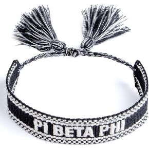 Sorority Shop Pi Beta Phi Bracelet — Woven Bracelet, Black and White Design with PBP Sorority Name and Tassels, Greek Sorority Jewelry and Big Little Sorority Gifts
