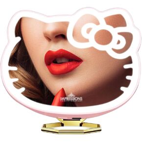 مرآة جيب مكبرة 3X من Impressions Vanity Hello Kitty مع حامل، مرآة مكياج مدمجة بإضاءة LED وإضاءة نهارية قابلة للتعديل للمكتب والسفر والمحفظة (وردي)