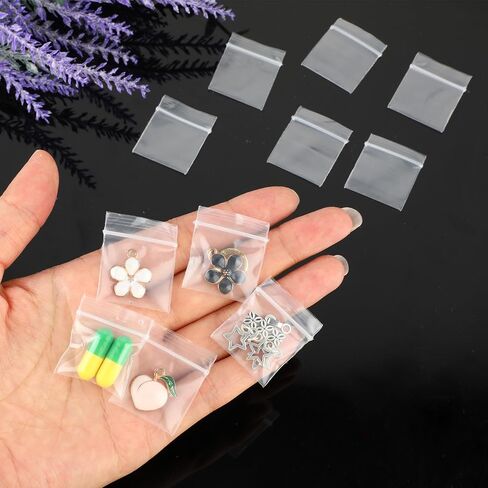 Giantree 200 Pieces 0.98" x 1.18" Plastic Zip Bags, 2 mil Jewelry Bags, Mini Zip Bags, Clear Small Pill Bag Resealable Zip Bag for Travel Small Business Storage Candy Bags (0.98 x 1.18'') in Saudi Arabia