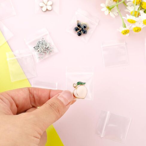 Giantree 200 Pieces 0.98" x 1.18" Plastic Zip Bags, 2 mil Jewelry Bags, Mini Zip Bags, Clear Small Pill Bag Resealable Zip Bag for Travel Small Business Storage Candy Bags (0.98 x 1.18'') in Saudi Arabia