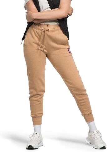 صندوق NSE Jogger النسائي من THE NORTH FACE (حجم قياسي وحجم إضافي)، زبدة اللوز/زبدة اللوز، كبير in Saudi Arabia