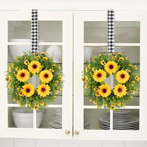 إكليل عباد الشمس الاصطناعي من Lvydec - إكليل زهور مزخرف مقاس 15 بوصة مع عباد الشمس الأصفر والأوراق الخضراء لديكور الجدار الداخلي للباب الأمامي in Kuwait