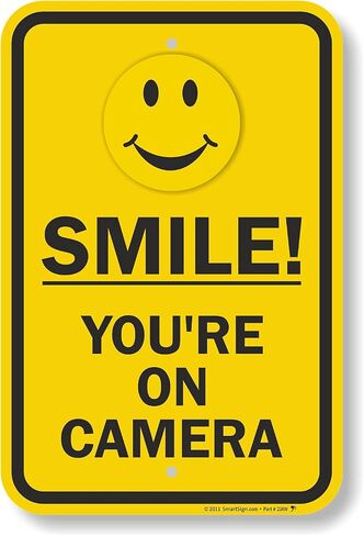 SmartSign "Smile You're On Camera" Sign | 12" x 18" Aluminum in Saudi Arabia