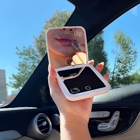 مرآة مضغوطة فائقة الجودة من Impressions Vanity Hello Kitty مع مفتاح مستشعر يعمل باللمس من أجل سطوع قابل للتعديل، ومرآة مكياج مضيئة مع أضواء LED ومرآة مكبرة 2X (وردي) in Kuwait