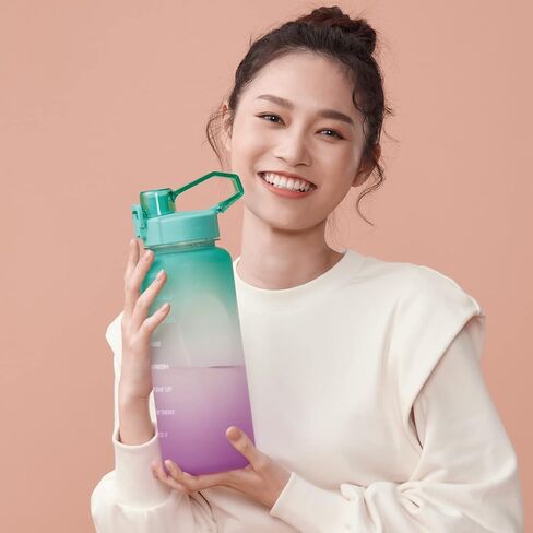 زجاجة مياه متدرجة من مينيسو مع أوقات للشرب والقش، خالية من مادة BPA، مانعة للتسرب وغير سامة، سعة 34oz مع حزام حمل - مثالية للرياضة واللياقة البدنية والأنشطة الخارجية - أزرق وردي in Kuwait