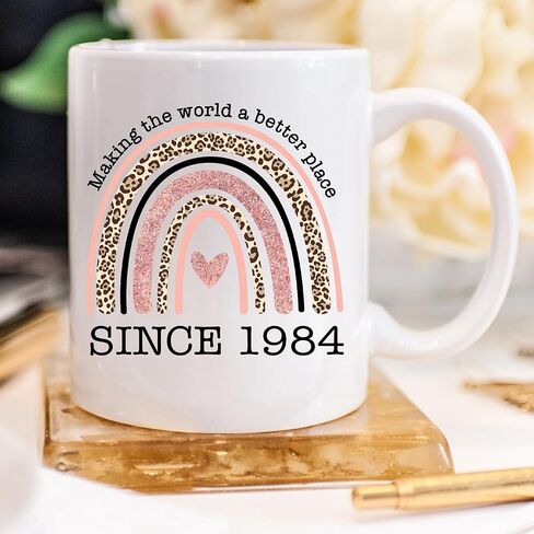 YouNique Designs Happy 40th Birthday Mug for Women, 11 Ounces, 1984 Birthday Cup for Women, 40 Year Old Birthday Coffee Mug for Women Turning 40 (Black Handle) in Saudi Arabia