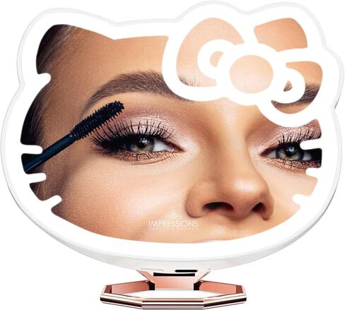 Impressions Vanity Hello Kitty 3X Magnifying Pocket Mirror with Stand, Adjustable Brightness Daylight LED Lighted Compact Makeup Mirror for Desk, Travel, Purse (Pink) in Kuwait